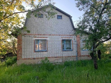 Будинок у селі Лисівка Попільнянського р-ну Житомирської області.