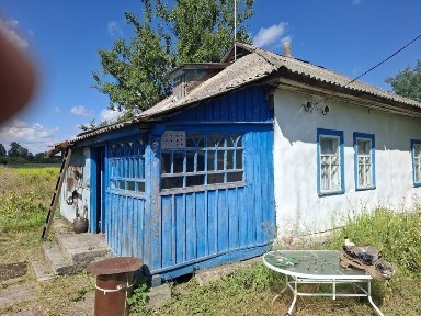 Ділянка з будинком біля річки Десна