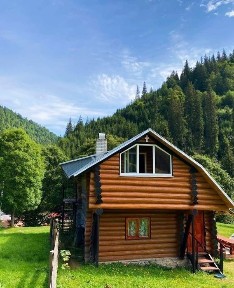 Житло біля озера СИНЕВИР котедж зі зрубу «Відлуння Горган» подобово