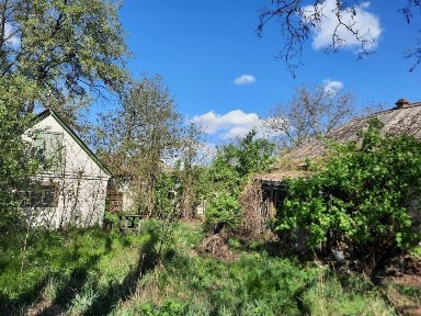 Продам 1/2 будинку