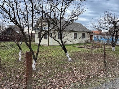 Продам будинок із земельною ділянкою