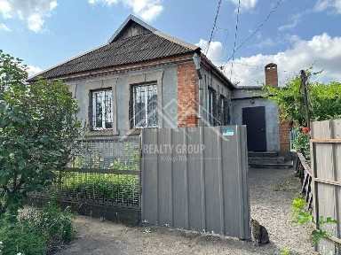 Продаж будинку з гаражем в Металургійному районі