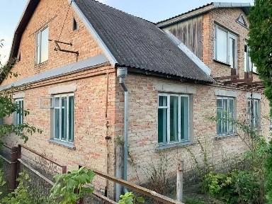 Продається цегляний будинок в центрі Обарова