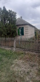 Капітальний будинок. Широка фасадна частина. Яворницьке