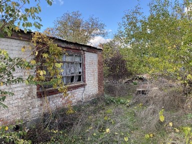 Ділянка з будинком по Халтуріна