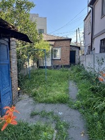 Продам дві частини будинку з окремим двором в центрі м. Біла Церква