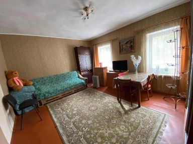 Частина будинку в центрі міста+ ділянка під забудову