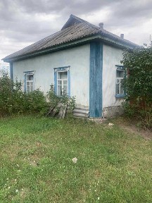 Хата в селі Строкова