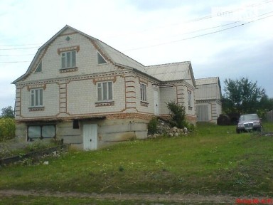 Продаж 2 поверхового будинку з гаражем і ділянкою на 25 соток, 200 кв. м, 5 кімнат, на Садова • ID 33446742