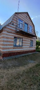 Продам фасадну ділянку з будинком в Корчаку