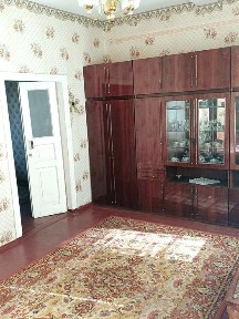 Затишний цегляний будинок з літнею кухнею та гаражем