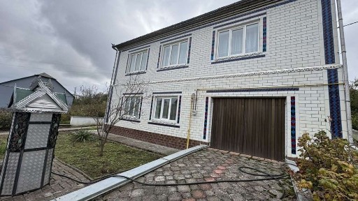 Продаж будинку, місто Городок