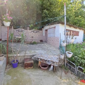 Продам 1\2 частину будинку в центрі міста Чугуїв!