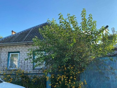 продаж будинку та земельної ділянки