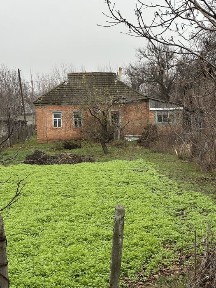 Пів будинку з земельною ділянкою 8,6 соток.
