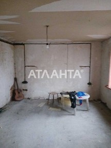 Будинок в Корсунцях біля ставку.