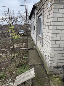 Продам двохкімнатний будинок з зитловою літньою кухнью район ЦРБ