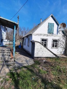 Продам дом с большим участком за 15000$