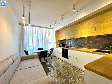 Код: 1083. Стильная двуспальная квартира с террасой возле моря.