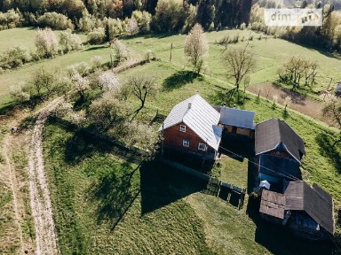 Продаж 1 поверхового будинку з гаражем 77 кв. м, 3 кімнати, на Центральна • ID 34165467