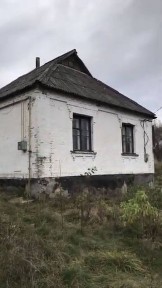 Продаж будинку з земельною ділянкою