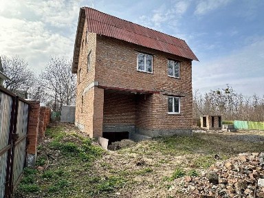Київська обл., Обухівський район, с. Підгірці, Будівельник