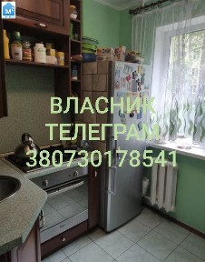 Власник