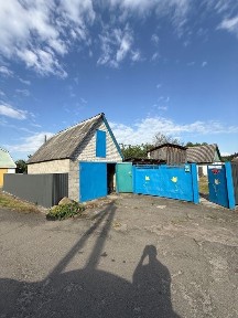 Продаж будинку з автономним опаленням, банею та 2 гаражами в Мигалках
