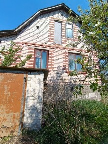 Цегляний будинок в Кобилянці біля Снова