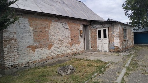 Будинок із ділянкою в с. Поправка, Газ, гараж, літня кухня.