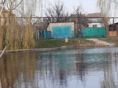 Продам дом Подгородное на берегу реки.