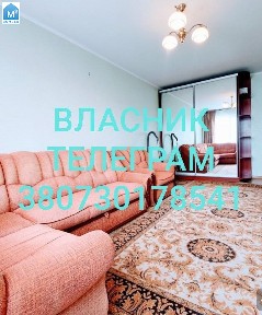 Власник