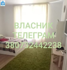 Власник