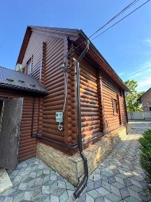 Продається житловий будинок у стилі карпатського зрубу в Реваківцях