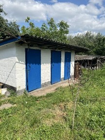 Продам 2/3 будинку в селі Ревне