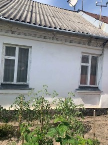 Продам частину будинку по вул. Базарній, земля у власності