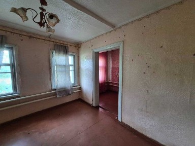 Продам 1\2 частина будинку м. Зміїв