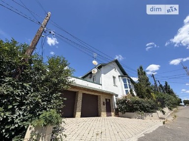 Продаж 2 поверхового будинку з гаражем і ділянкою на 5.3 сотки, 325 кв. м, 5 кімнат, на вул. Привільна • ID 34438724