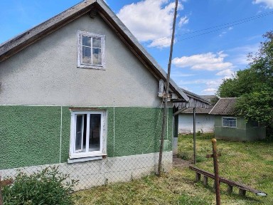 Продається земельна ділянка з будинком
