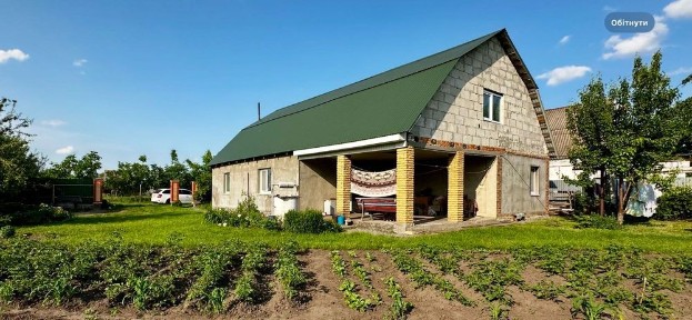 будинок на березі річки 2010 р. / Гребінки