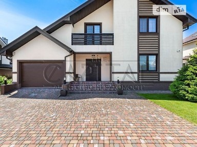 Продаж двох будинків на ділянці 14 соток. Закрите котеджне містечко. Основний будинок 240 м2 та гостьовий будинок 100 м2