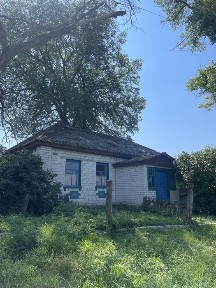 Будинок з сараєм
