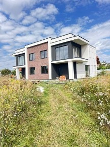 Продам житловий будинок (1/2 частину дуплексу) після будівництва в с. Кам'янопіллі (біля окружної траси) біля Львову