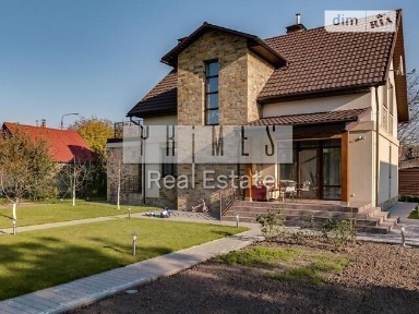 Продаж 2 поверхового будинку з гаражем і ділянкою на 6 соток, 169.4 кв. м, 5 кімнат, на вул. Озерна • ID 34566239