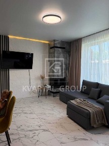 Таунхаус 107 м² з дизайнерським ремонтом та каміном