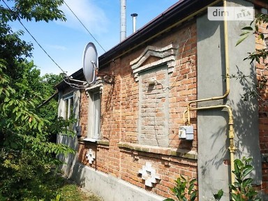 Продаж 1 поверхового будинку з опаленням і ділянкою на 6 соток, 58 кв. м, 2 кімнати, на вул. Польова • ID 34577010