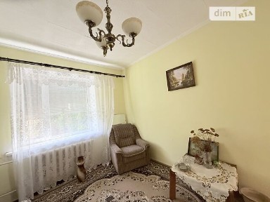 Продаж 1 поверхового будинку з опаленням і ділянкою на 6.95 сотки, 70.6 кв. м, 2 кімнати, на вул. Тисова • ID 34589363