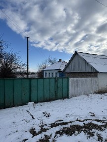 Будинок з земельною ділянкою