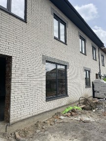 Кутовий таунхаус 60 м² з власною ділянкою