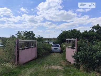 Продаж 1 поверхового будинку з гаражем і ділянкою на 24 сотки, 58 кв. м, 3 кімнати, на вул. Шевченка 216 • ID 34597623
